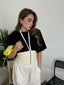 T-shirt con Spallina